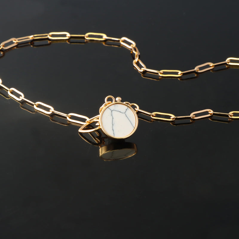 Cross Chain Necklace with Geometric Circular Pendant