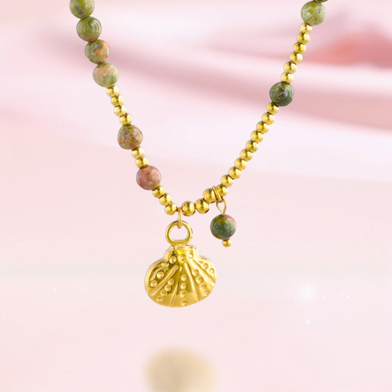 Gold O-chain necklace with natural stone and metal shell pendant