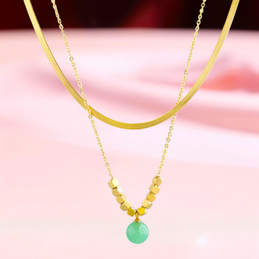 Multi-layered Serpentine Bone Necklace with Natural Stone Pendant