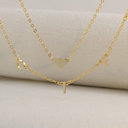 Elegant stainless steel O-ring chain with heart and letter pendant
