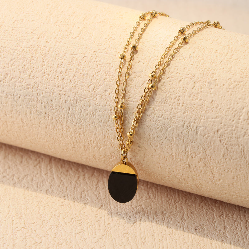 Gold Stainless Steel O-Chain Necklace with Black Beaded Pendant