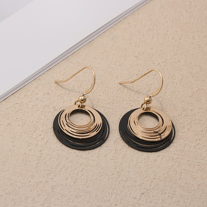 Unique Copper Hoop Earrings with Spiral Pattern