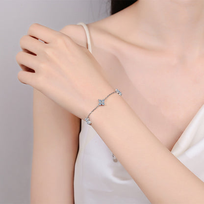 Minimalist Nature-Inspired Rhodium Plated Sterling Silver Bracelet - 2ct Moissanite with Shell & Starburst Design