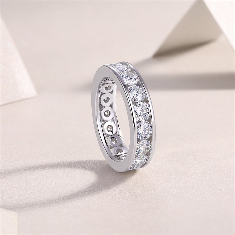 Polished Silver Ring with Round Moissanite Stone