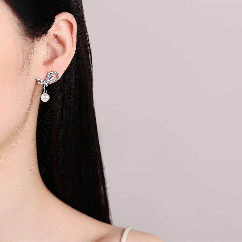 S925 Sterling Silver Bow Stud Earrings - 0.28ct Moissanite & 7-8mm Freshwater Pearls