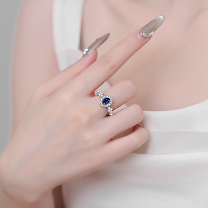 S925 Sterling Silver Oval Blue Moissanite Ring with Floral Motifs
