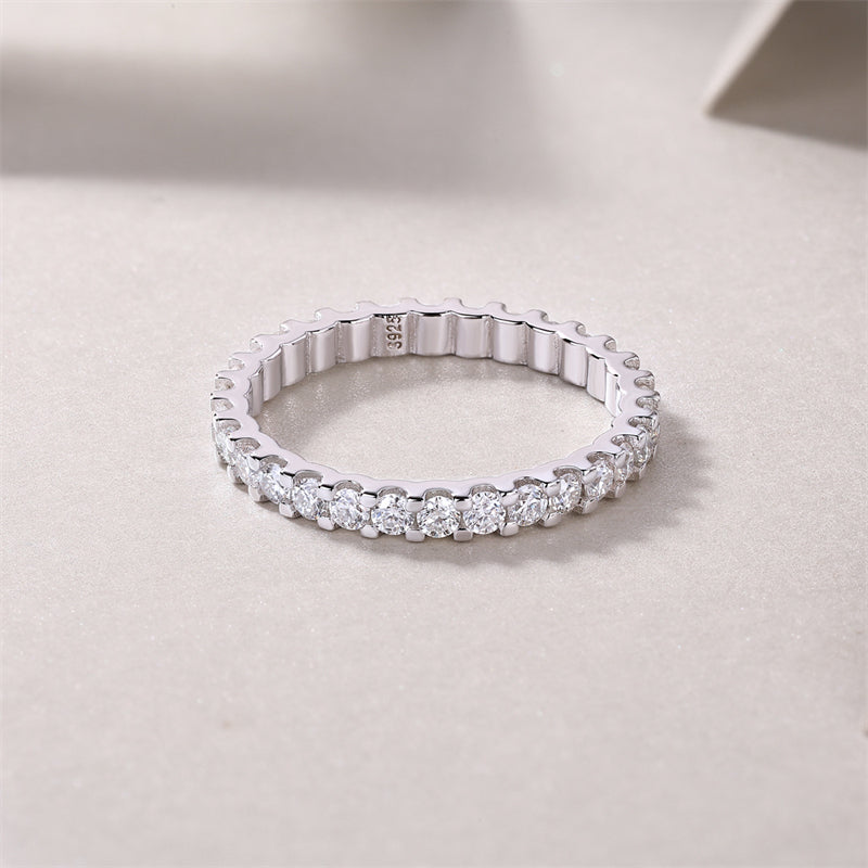 Shimmering Silver Ring with Round Moissanite Stones